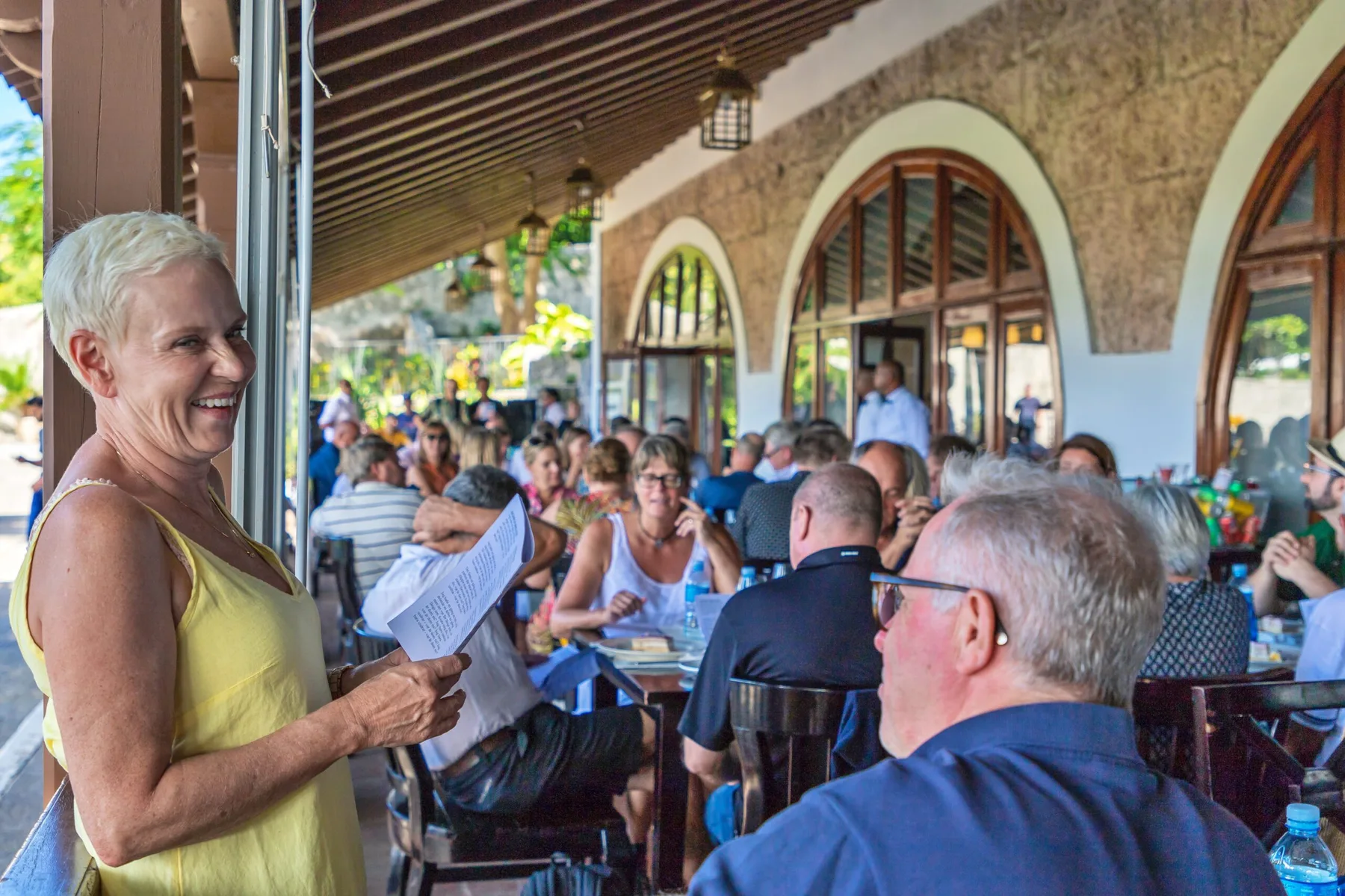 A company team gathered together for dinner during a corporate retreat