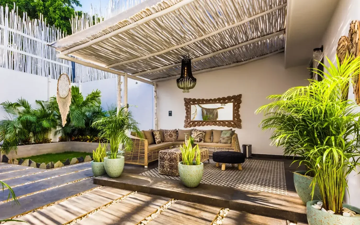 The shaded terrace and garden of the Sanctuary in Playa del Carmen