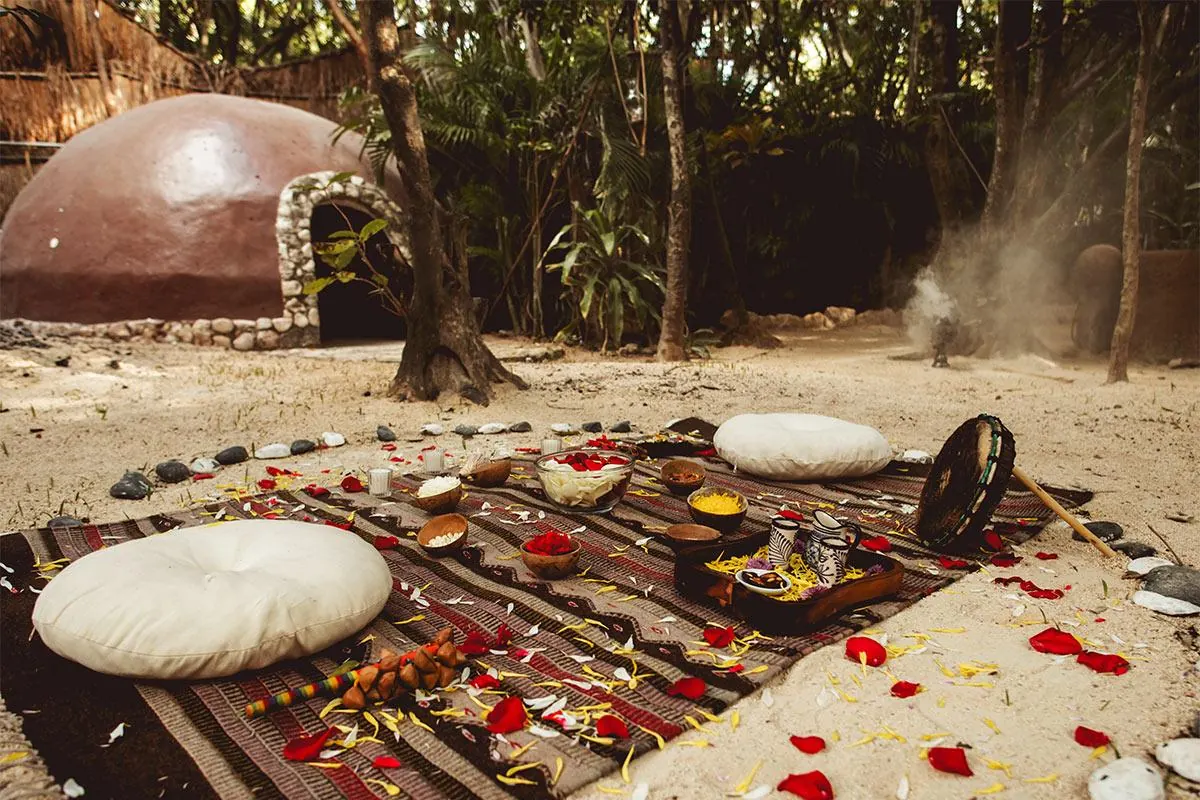 The temazcal sweat lodge prepared with flowers and copal